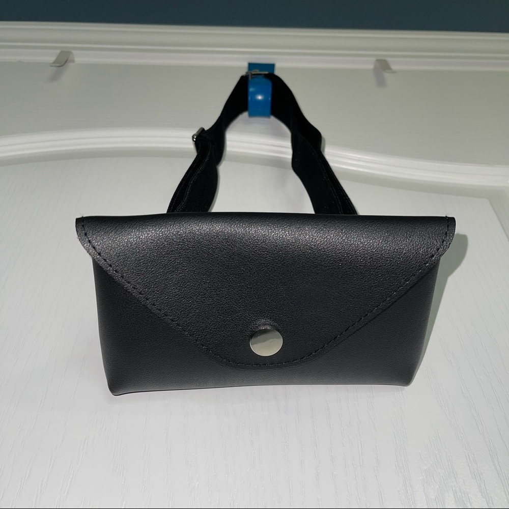 Never used small black Amazon fanny pack.